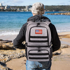 ATRIPACK tactical double-deck cooler backpack bottom-compartment detail highlights cold storage for beverages and ice packs.