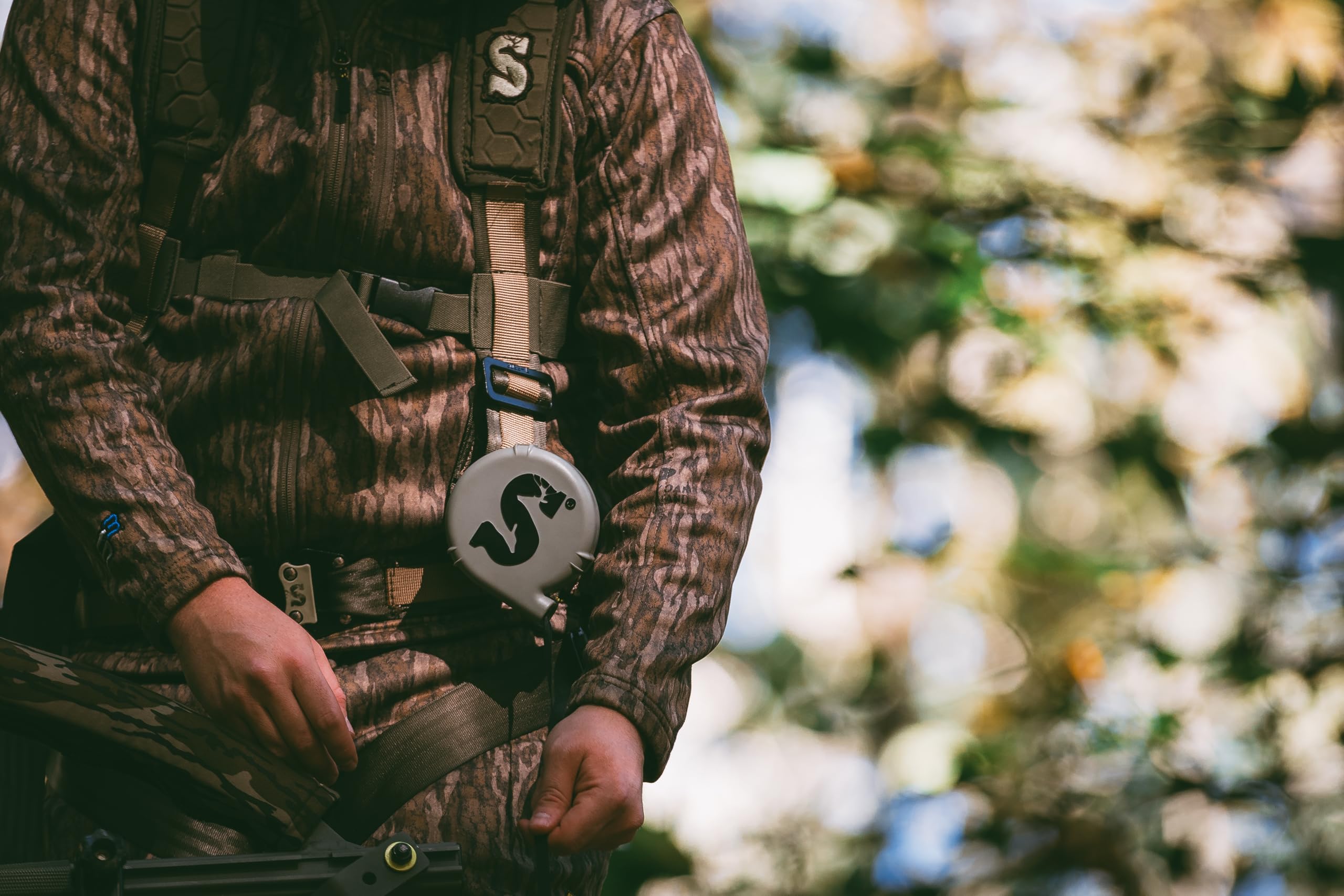 Attachment options showing belt, safety harness, treestand