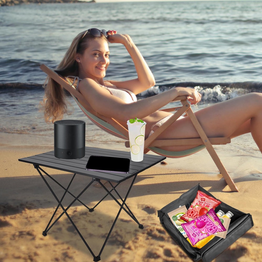 Audoyon foldable camping side table folded compact for easy transport.