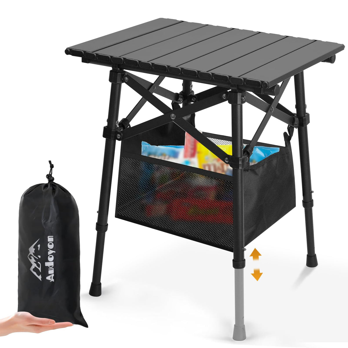 Audoyon folding camping table setup on beach with stable legs for meals