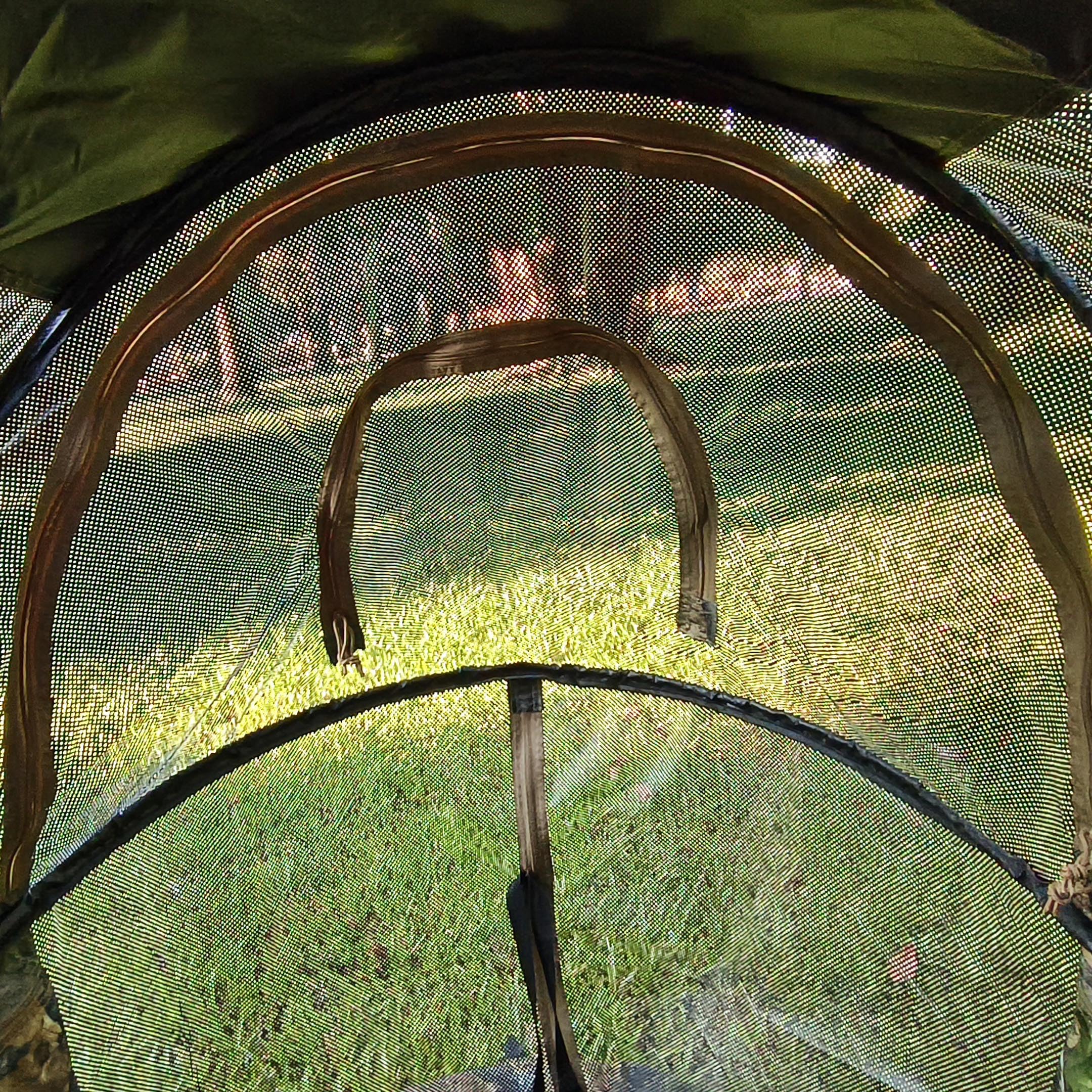 AUSCAMOTEK camouflage pattern blends with natural surroundings for concealment.