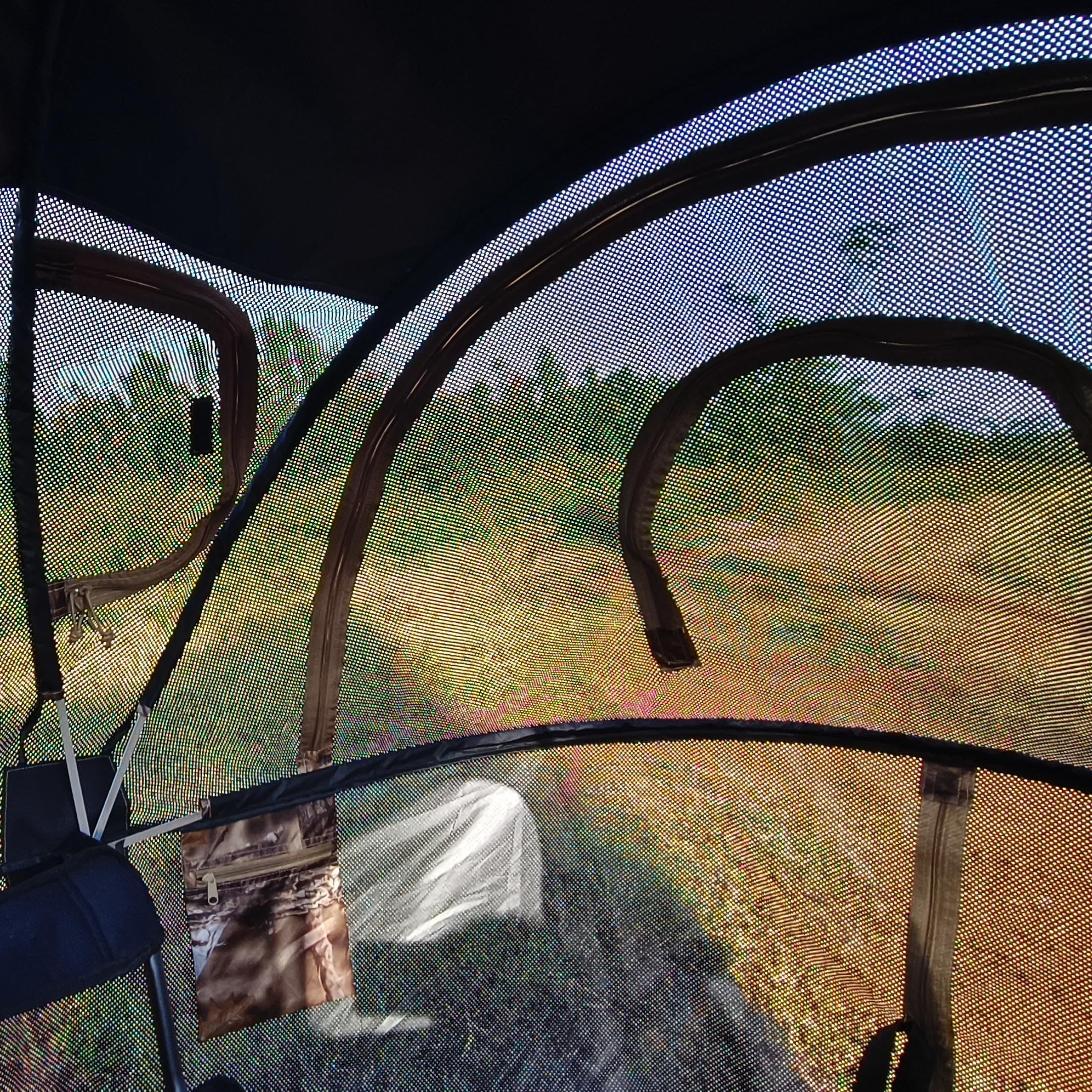 AUSCAMOTEK woodland camouflage blends with surroundings for concealment.