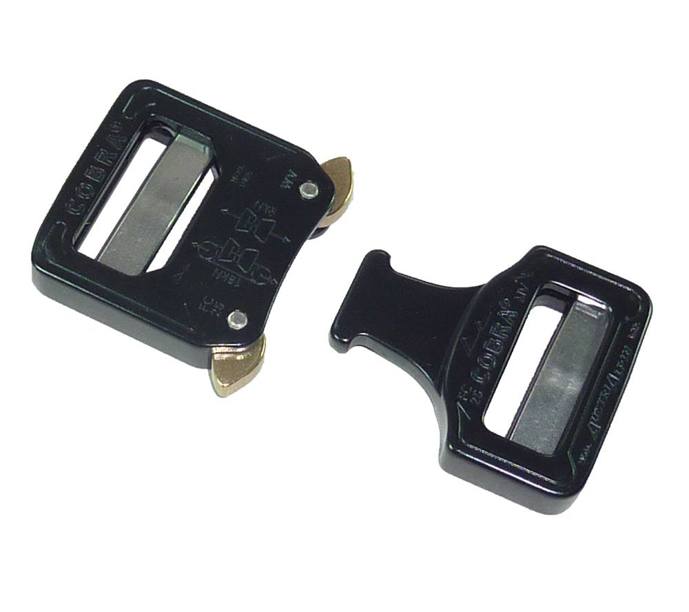Austrialpin Cobra buckle undergoing quality assurance testing highlights reliability.