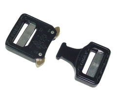 Austrialpin Cobra buckle undergoing quality assurance testing highlights reliability.