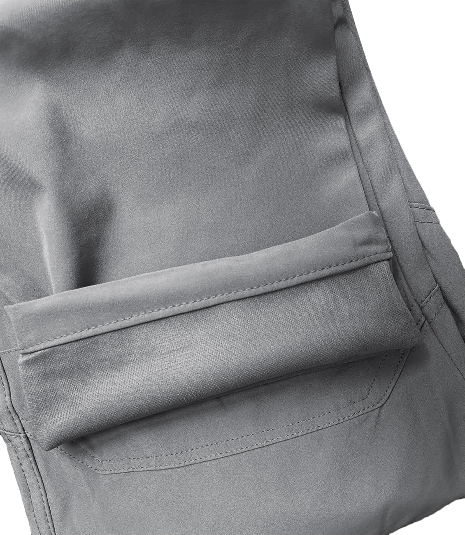 AUTIWITUA rugged cargo pants in action during outdoor adventure.