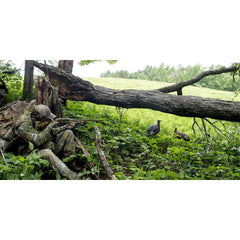 Avian-X Lookout Hen decoy visible in tall grass for visibility