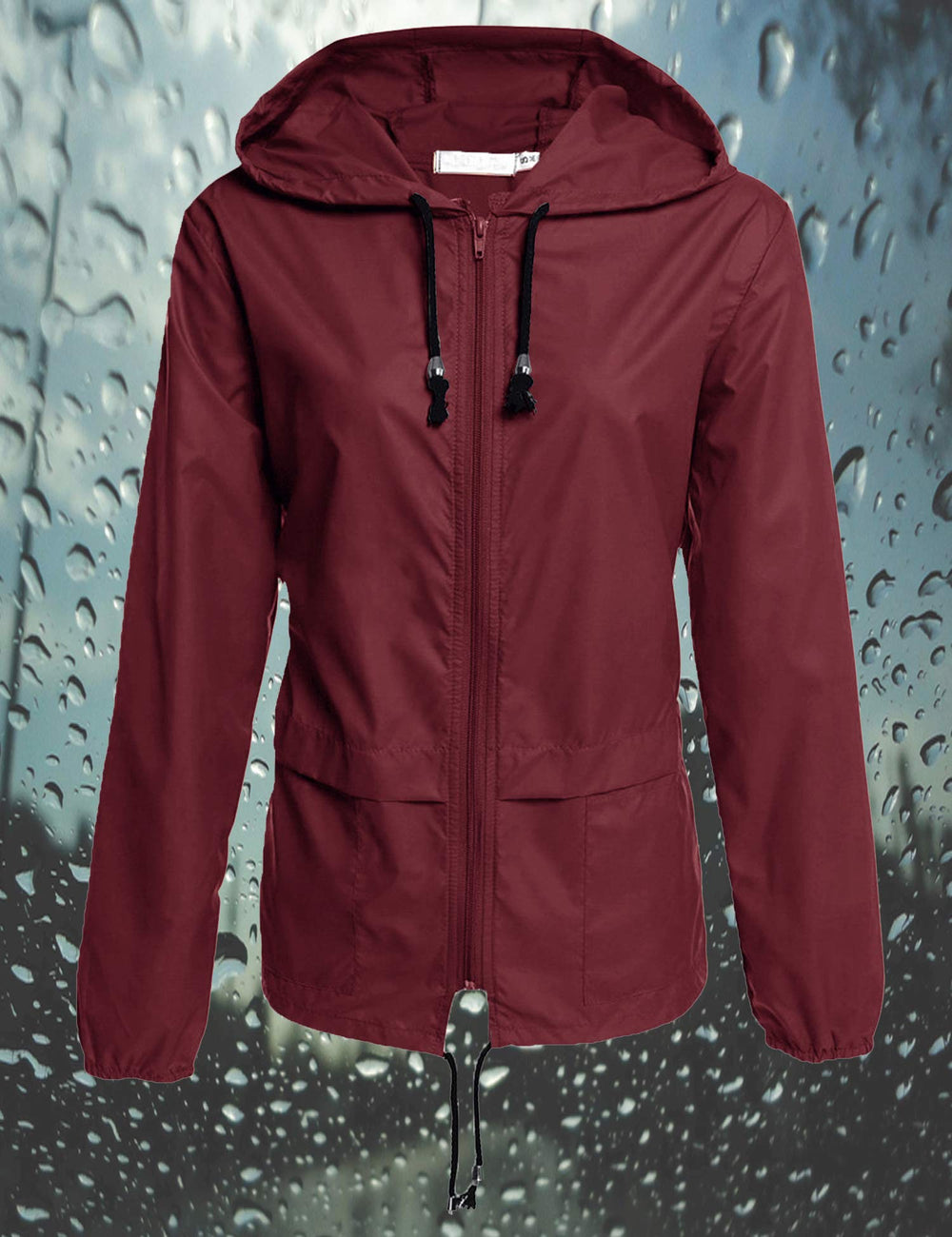 Avoogue women's wine red hooded rain jacket worn for everyday wear and light protection.