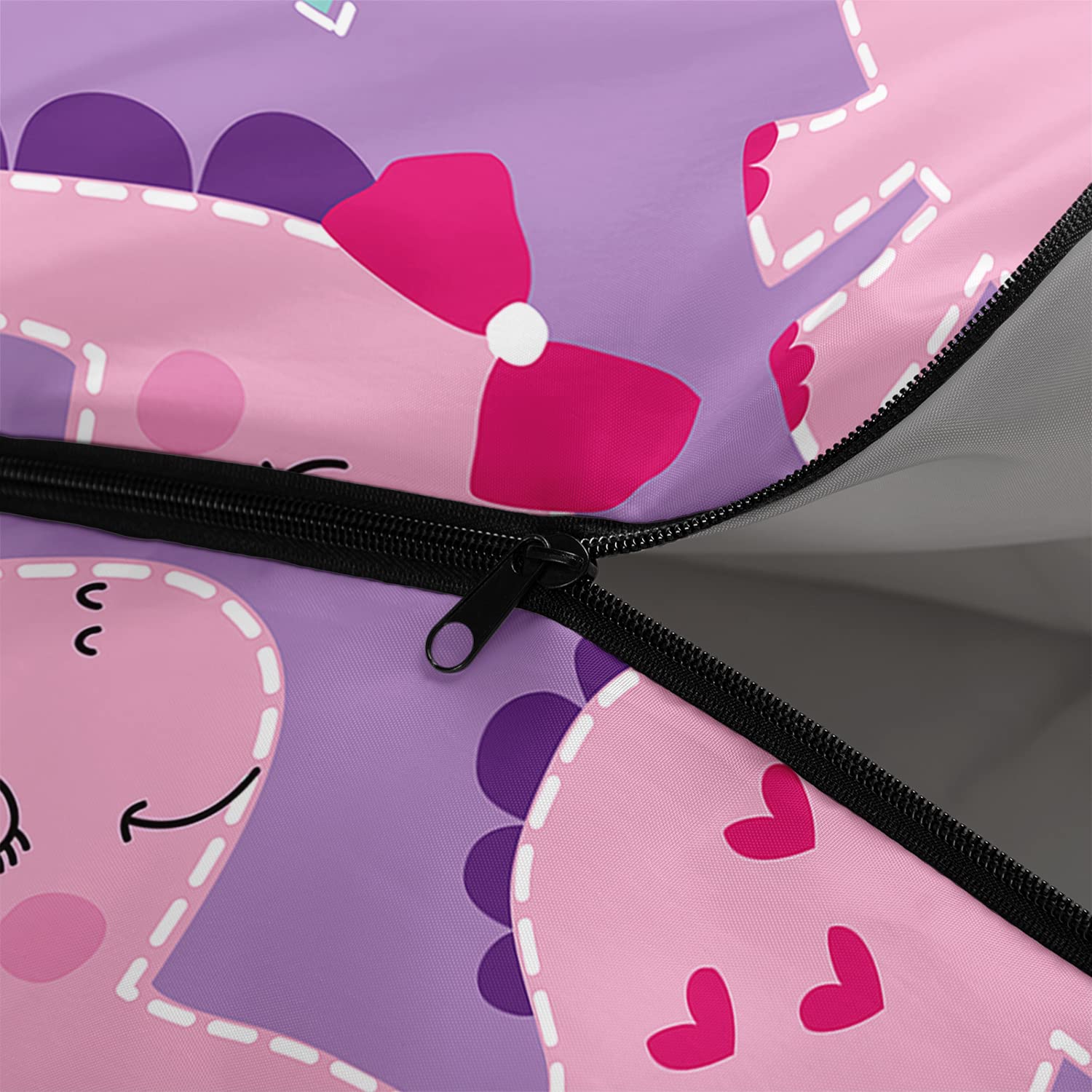 Axolotl pink purple dinosaur sleeping bag on tent setup demonstrates lightweight warmth.