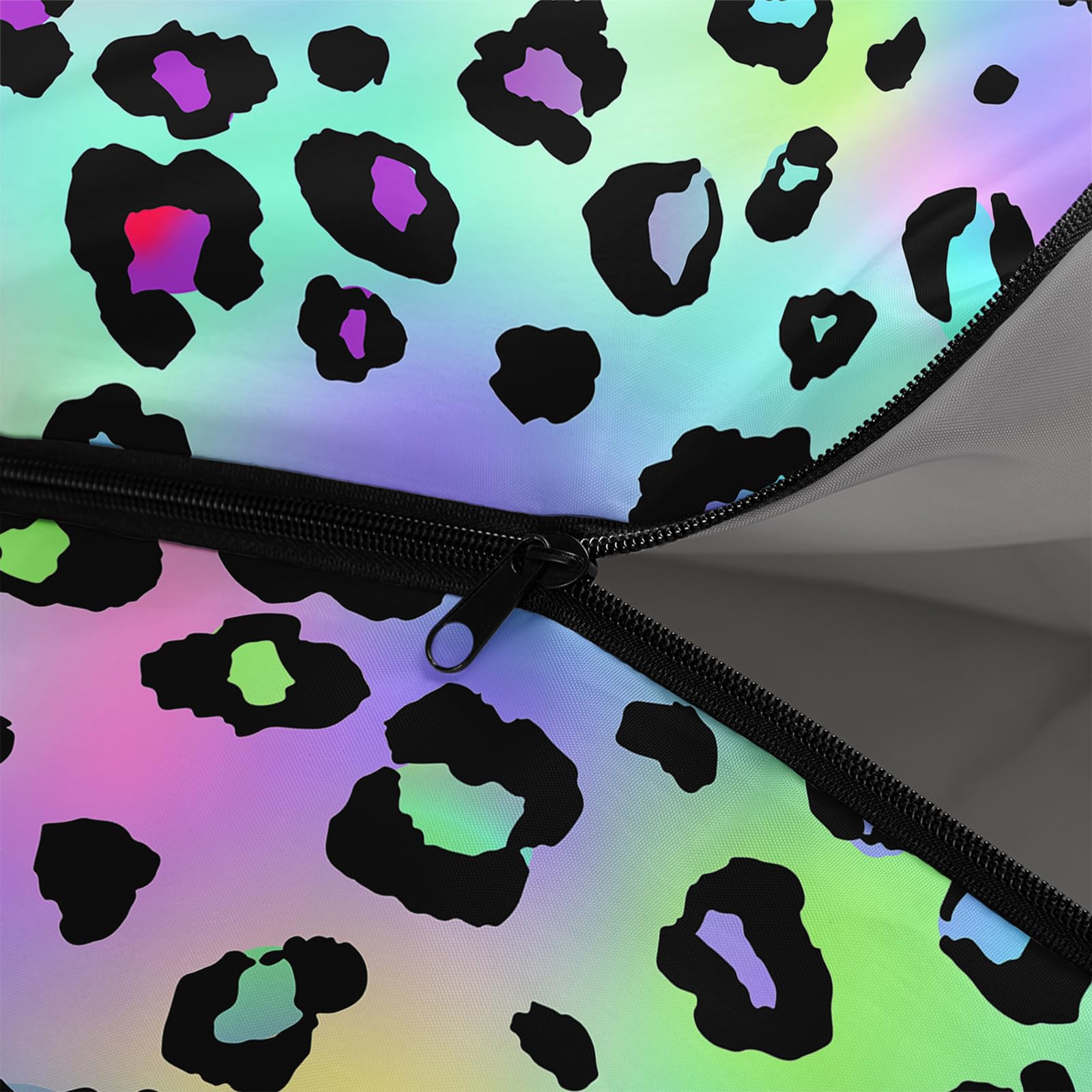 Axolotl leopard sleeping bag side-zip shows wind-blocking design for cool nights.