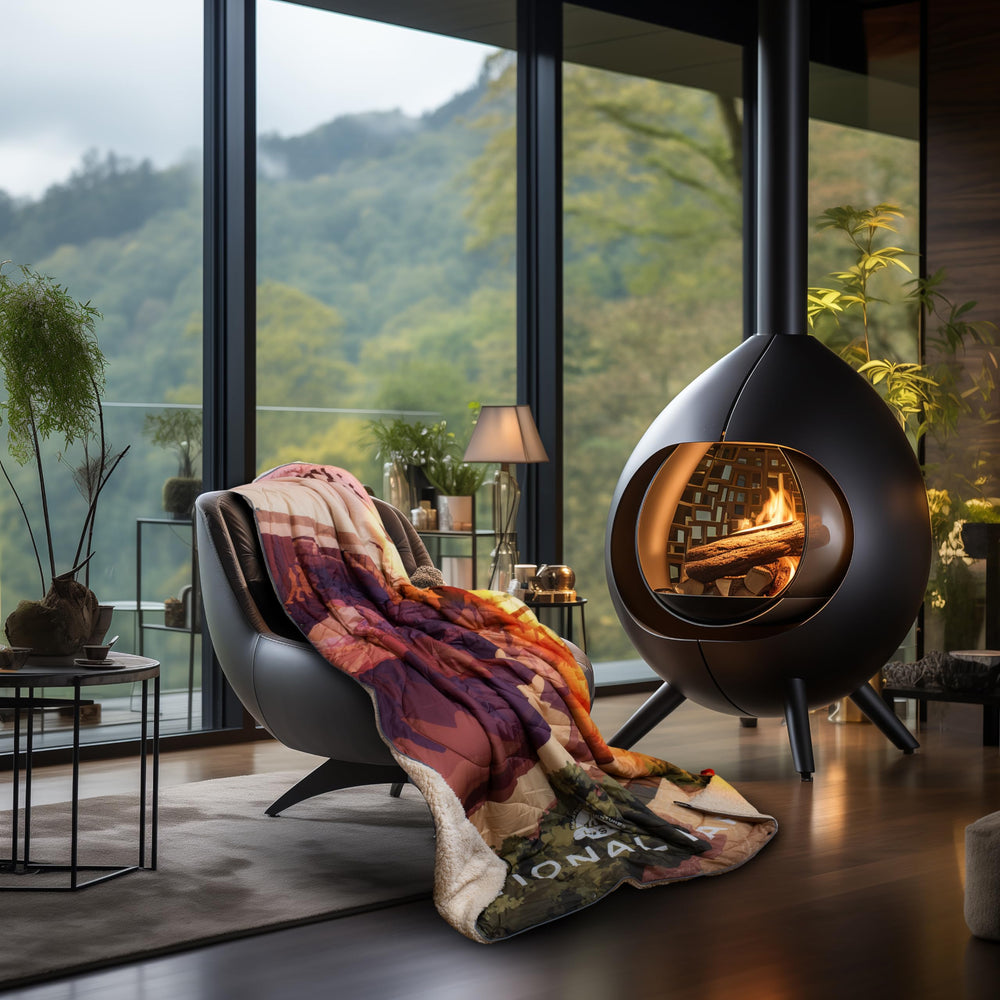 AZITREK sherpa-lined blanket worn as poncho for hands-free outdoor warmth.