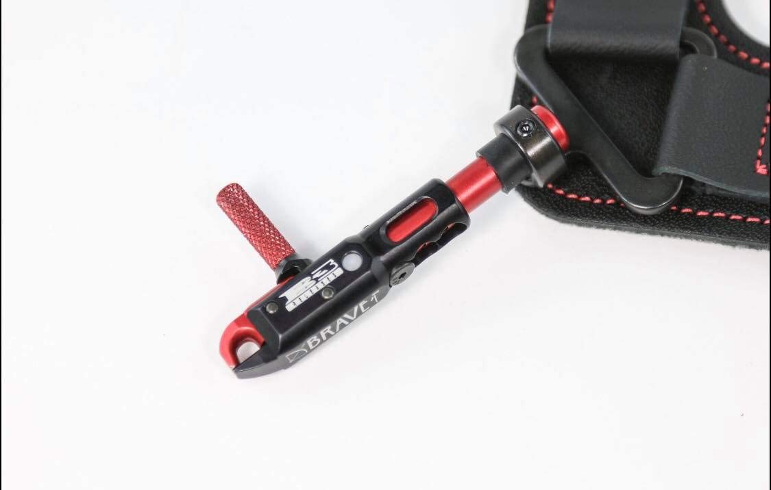 B3 Archery Brave red swivel stem shows compact fit for youth shooters.