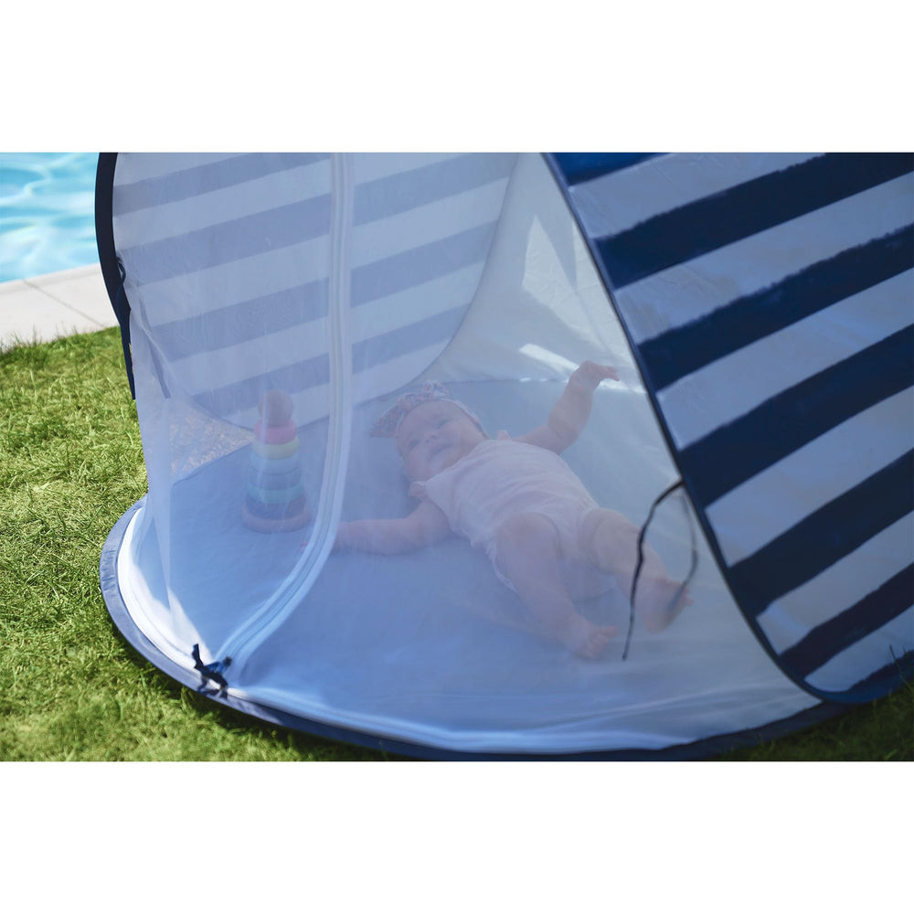 Babymoov anti-UV tent with carry bag for travel.