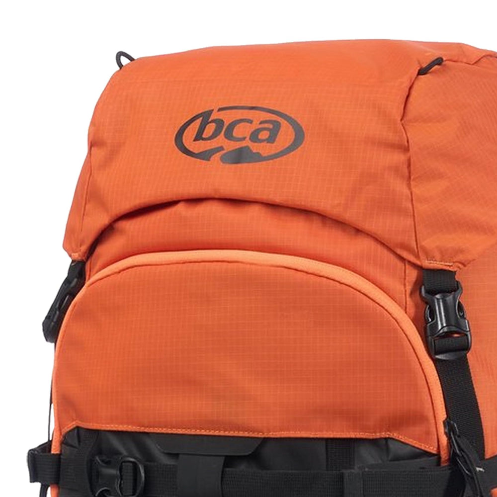 Backcountry Access Stash 40 orange side view showing compact silhouette