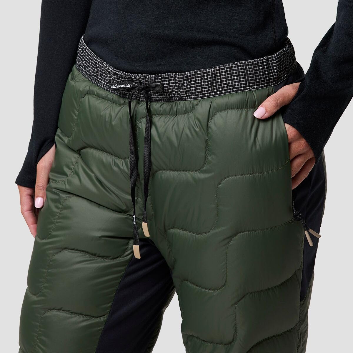 Backcountry Waas Allied Down Pant Ivy insulation closeup emphasizes 800-fill warmth