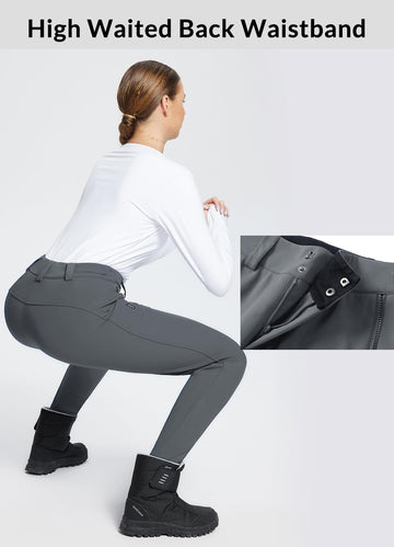 Baleaf women's snow pants with ankle zipper for easy on off and wind protection.