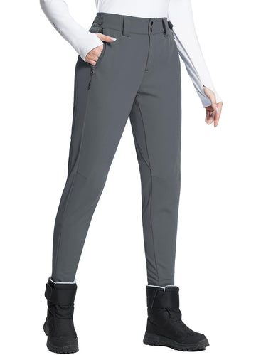Baleaf women's fleece-lined snow pants waterproof outer keep you dry on snowy days.