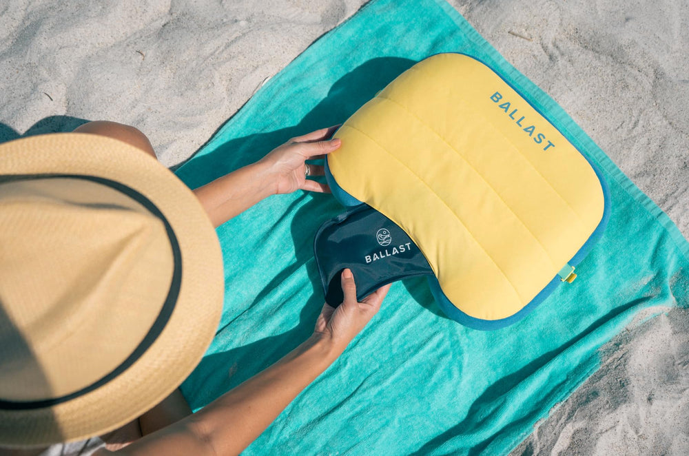 Ballast Beach Pillow contoured bottom cradles neck for comfortable lounging.