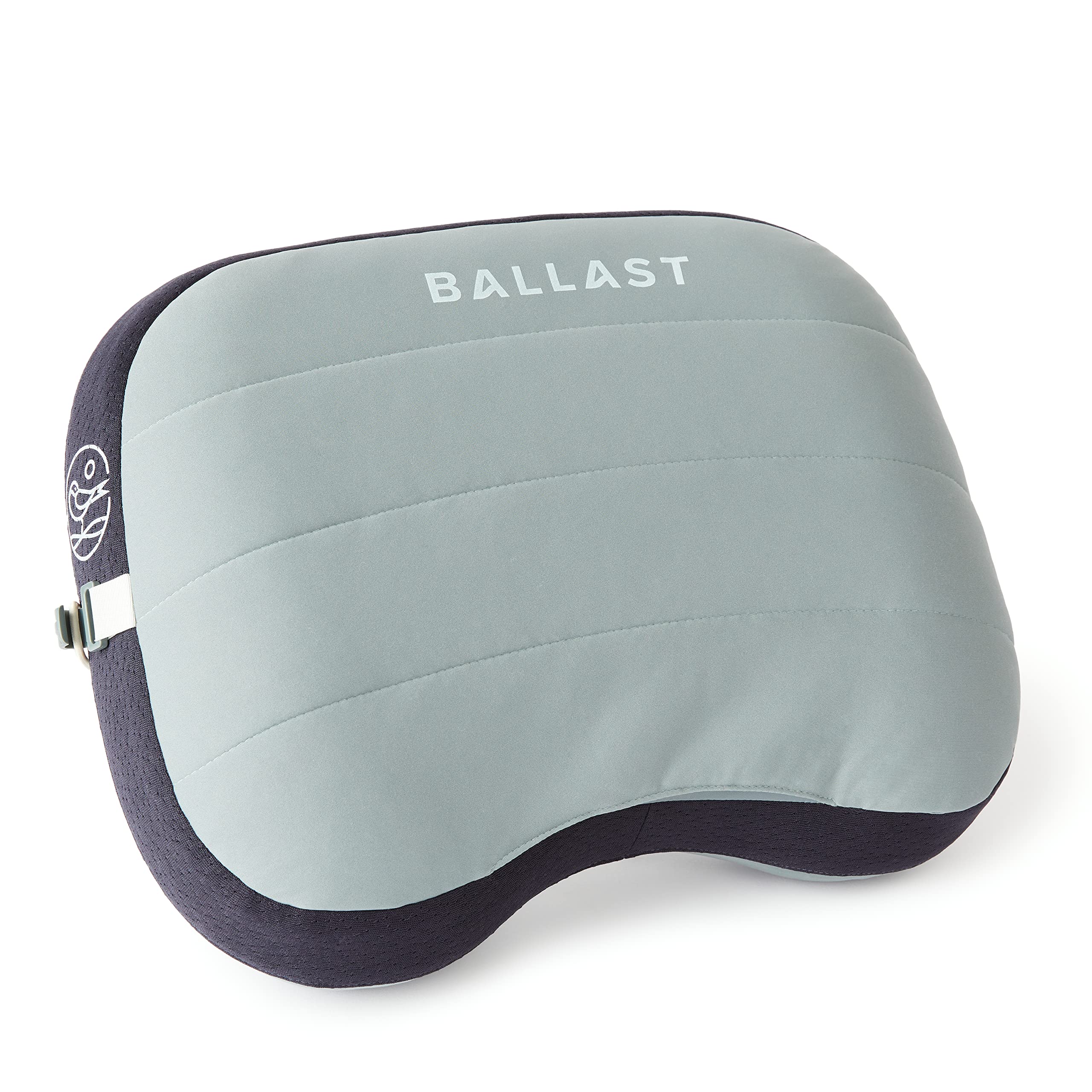 Ballast Beach Pillow inflated on sand provides portable beach comfort.
