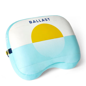 Ballast Beach Pillow on a windy beach stays put for relaxed lounging.