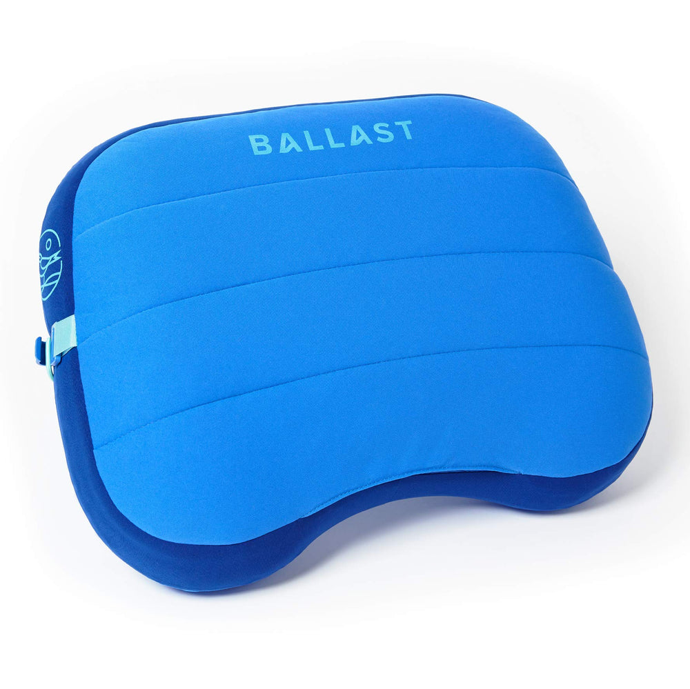 Ballast Beach Pillow on a windy beach stays put for relaxed lounging.