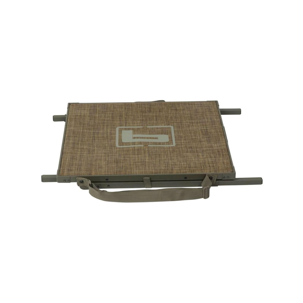 Integrated leg stubs keep the stand secure on gravel, mud, and hard ground