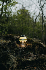 Barebones Beacon Hanging Light dusty yellow glow on porch for cozy evenings