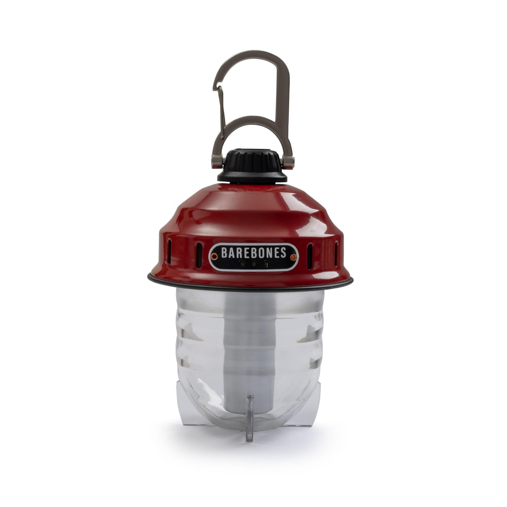 Barebones Beacon hanging light red on porch delivers warm ambiance for evenings outdoors.