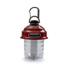 Barebones Beacon hanging light red on porch delivers warm ambiance for evenings outdoors.
