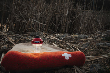 Barebones Beacon hanging light red year-round use supports emergencies and camping nights.