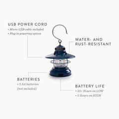 Barebones Edison Mini Lantern hanging from a branch for outdoor gatherings.