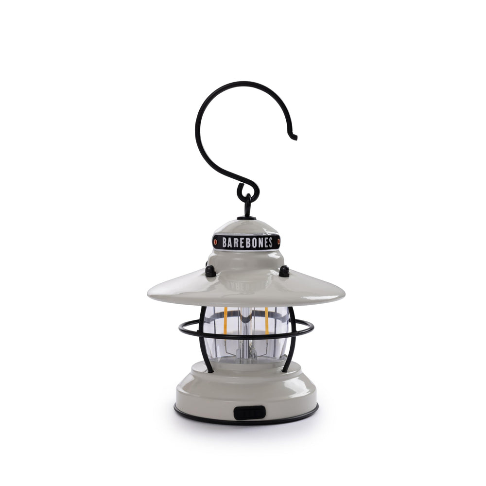 Barebones Edison Mini Lantern in vintage white provides ambient outdoor light for camping.