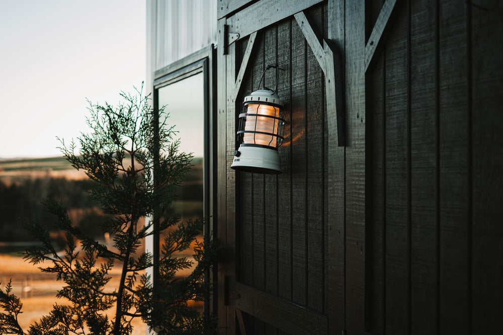 Barebones Forest Lantern backyard-scene at dusk demonstrates cozy ambient lighting