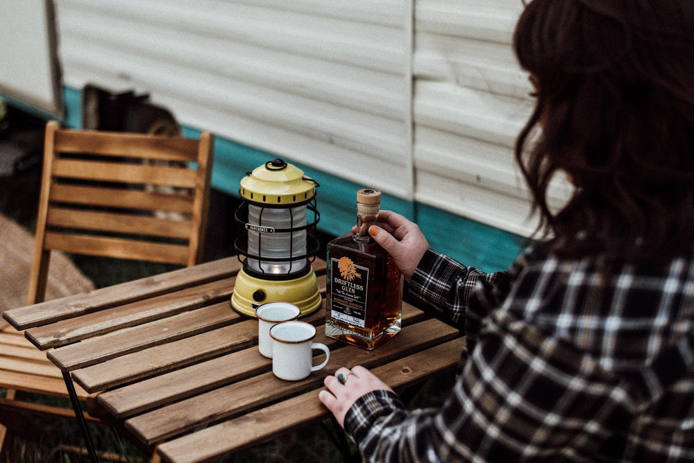 Barebones Forest Lantern in use at dusk reveals warm ambiance and reliable light.