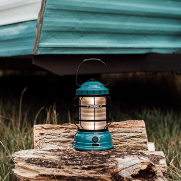 Barebones Forest Lantern teal lighting for backyard gatherings.