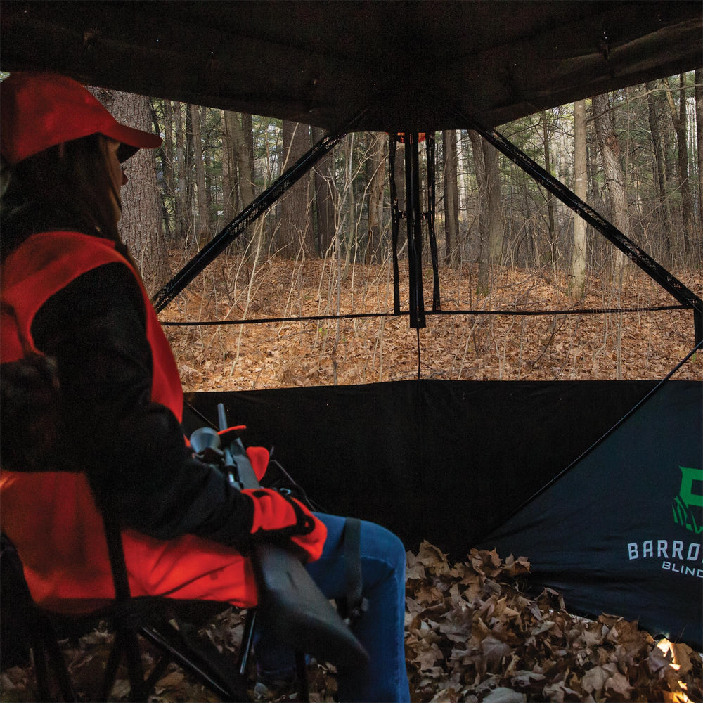 Brush holders offer optional additional concealment in natural terrain.