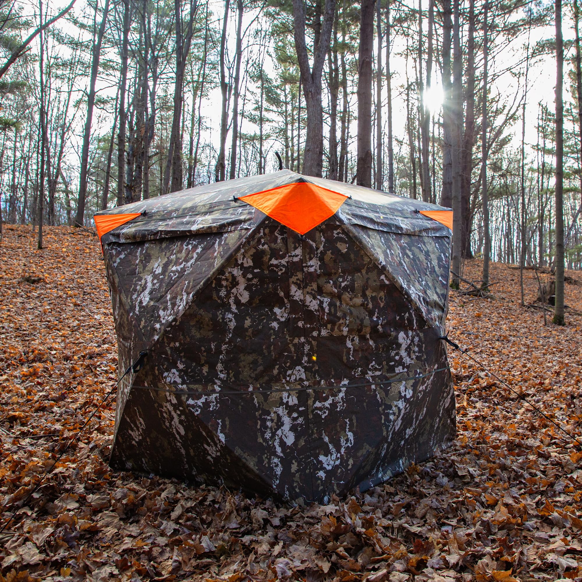 Carrying bag with backpack straps enables easy transport to hunting spots.