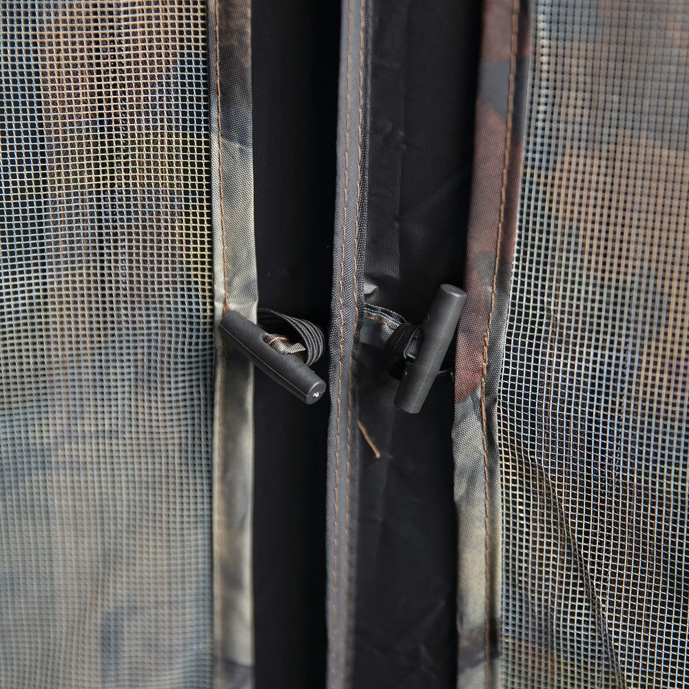 Barronett Blinds Tag Out Hub ground stakes for solid ground setup.