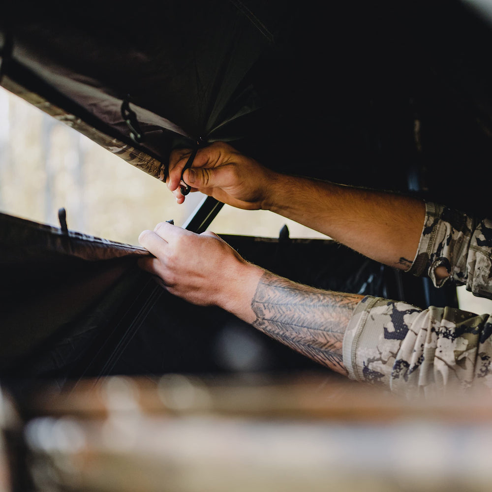 Two-person side-by-side setup inside Barronett Blinds Wide Side 95