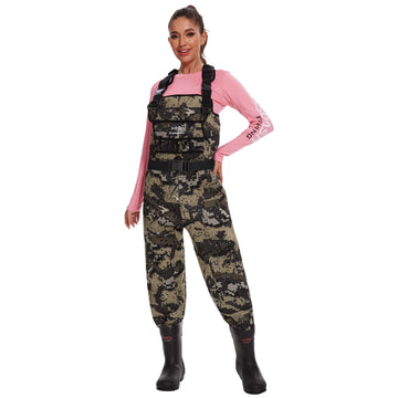 BASSDASH Women Neoprene Chest Waders in Desolve Bare camouflage provide waterproof fishing readiness.