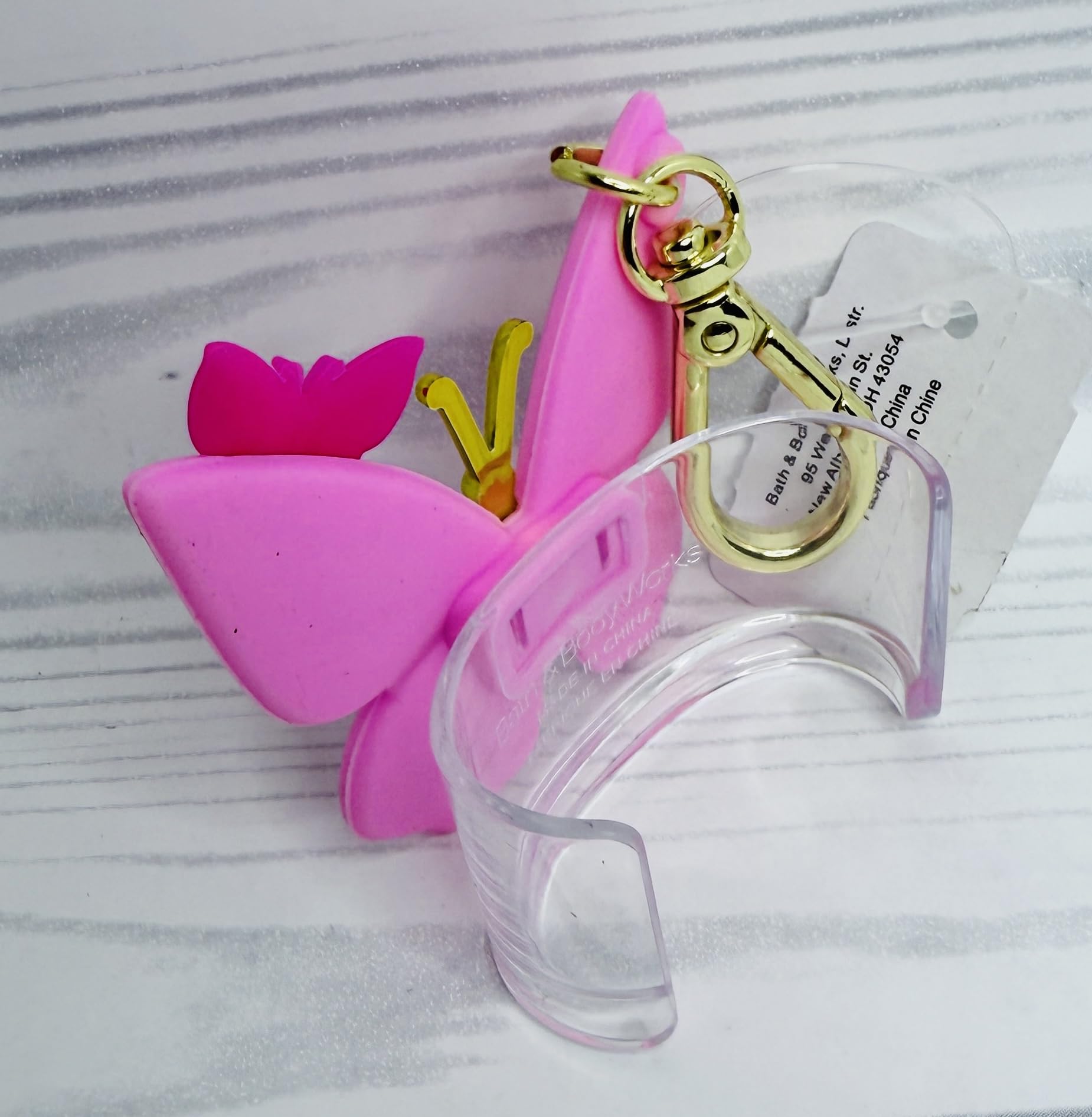 Exclusively designed for PocketBac sanitizers, showcasing a pink butterfly motif.