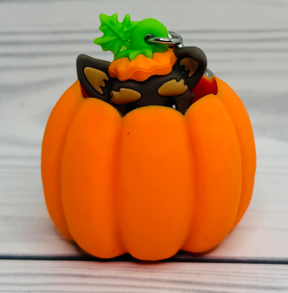 Bath & Body Works Pop-up Pup Pumpkin PocketBac Holder attached to a bag for quick sanitizer access.