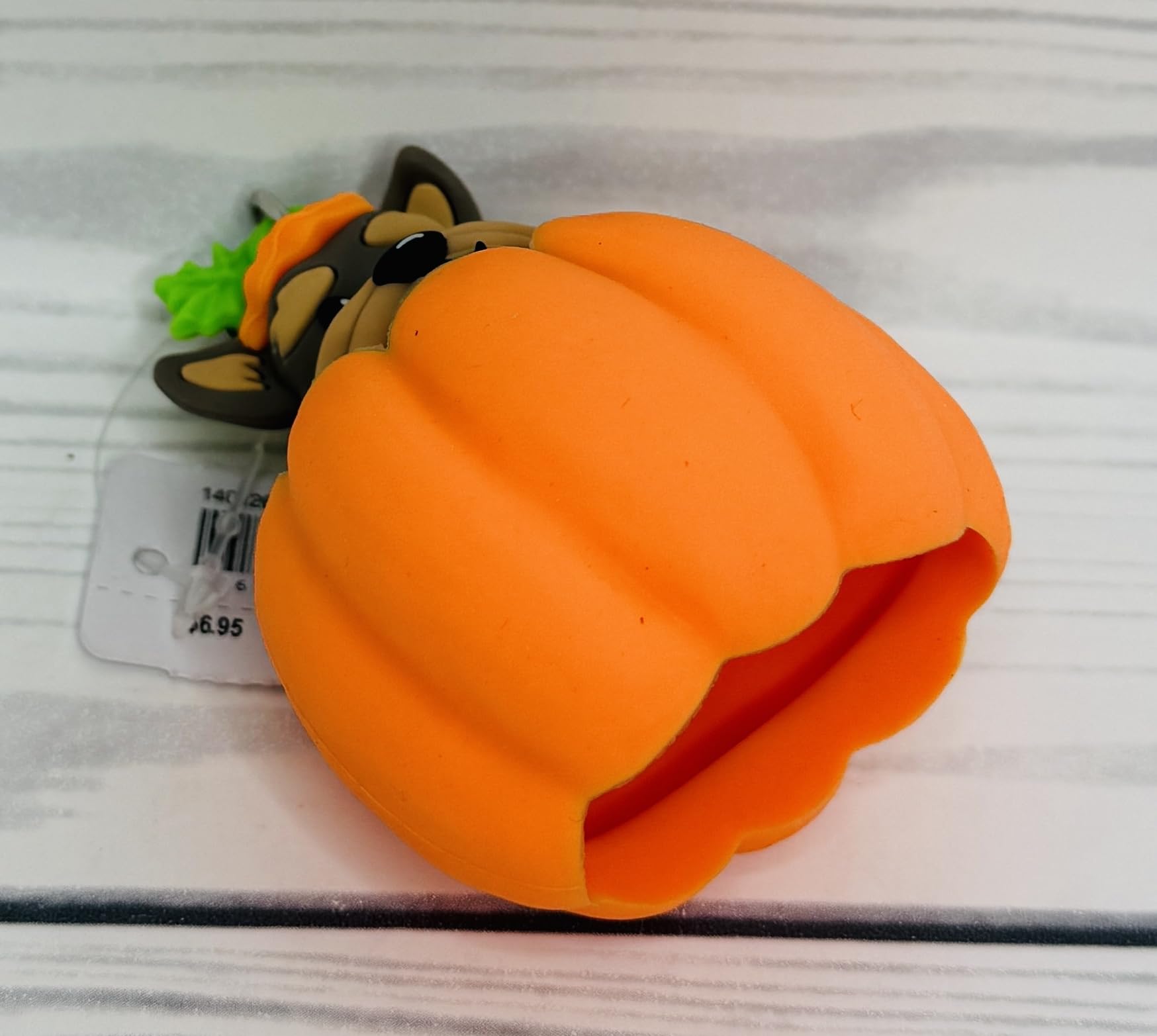 Close-up of Bath & Body Works Pop-up Pup Pumpkin PocketBac Holder showing a sleek silver clip.