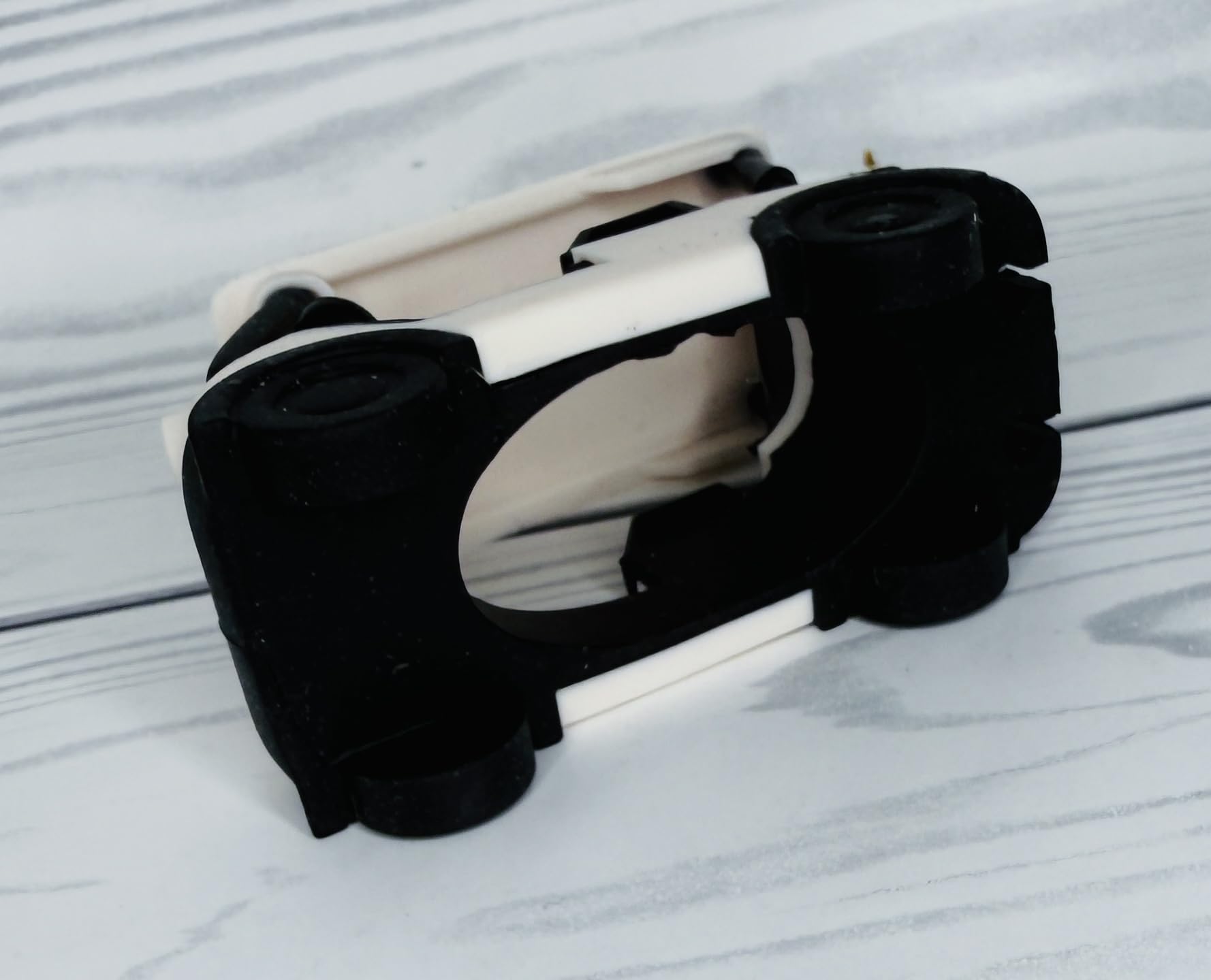 Bath and Body Works golf cart holder stores two tees tucked at the back.