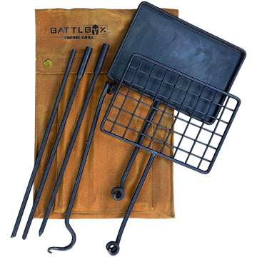 BATTLBOX Bushcraft Grill Set assembled for portable campfire cooking with swiveling grills.