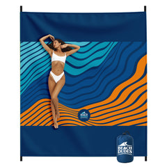 Beach Dudes Blue Waves blanket folded, ideal for compact carry and quick beach setup.