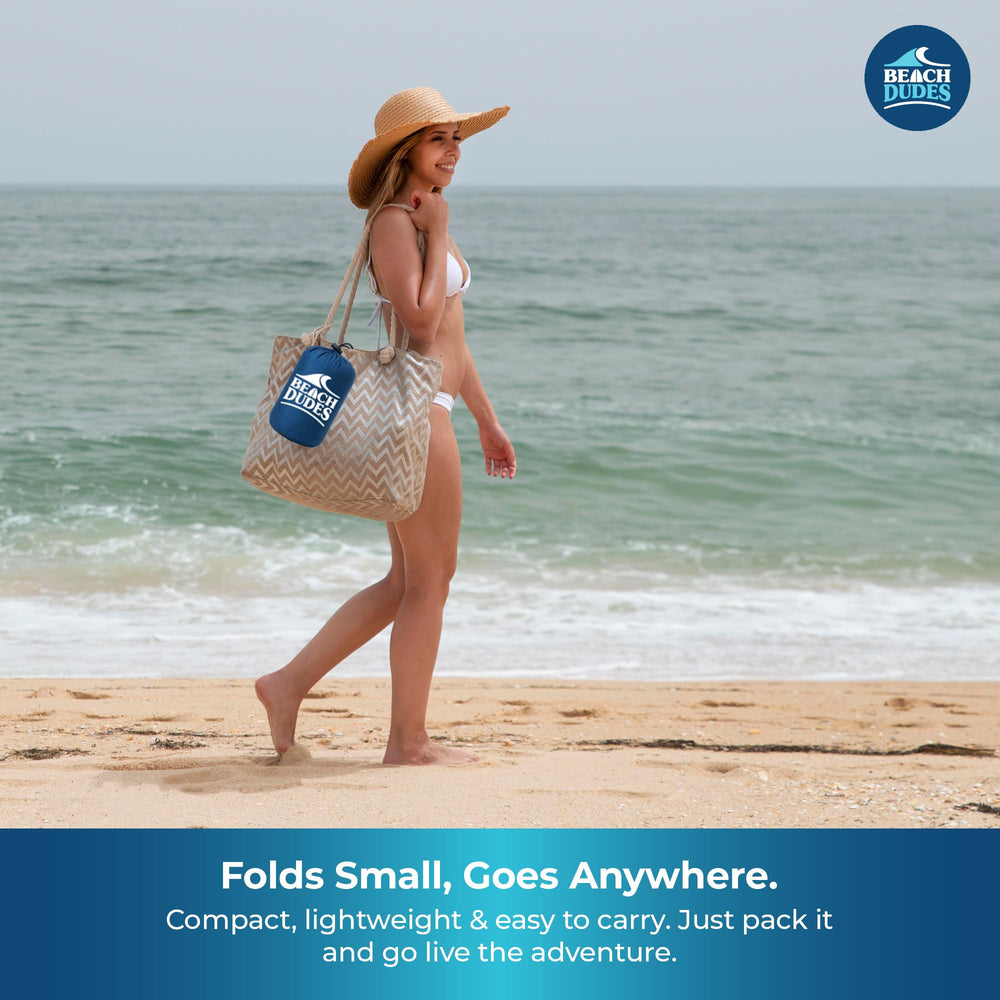 Beach Dudes Blue Waves blanket sand-repellent surface, eases cleanup at the shore.