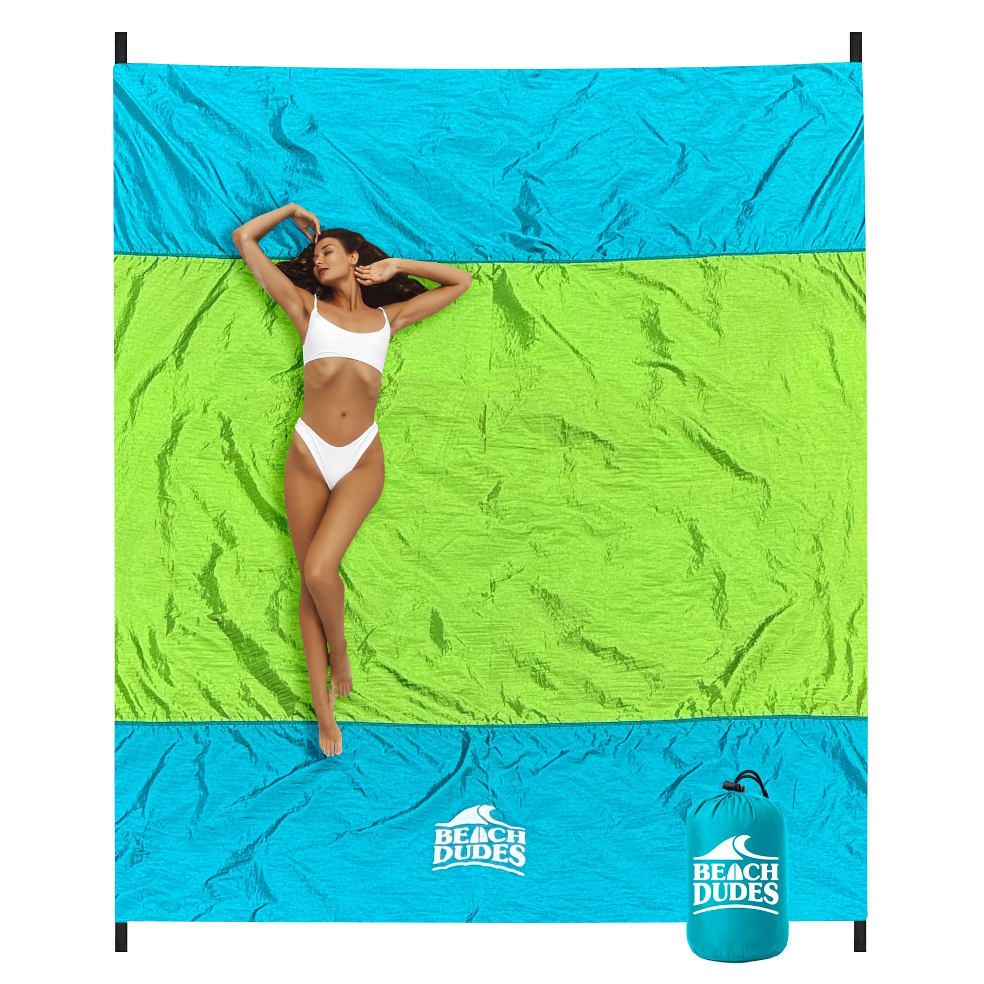 Beach Dudes Green Spirit blanket on sand for a family beach day