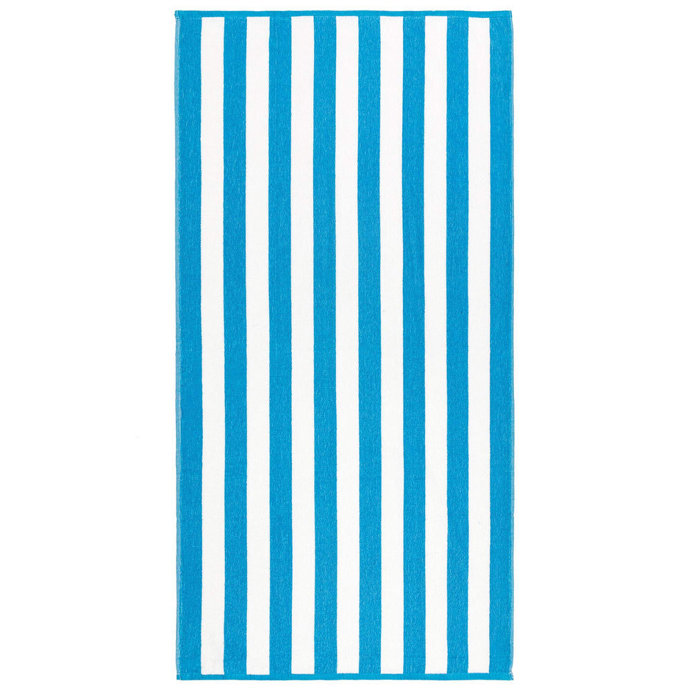 Beachland Classic Cabana Stripe towel on the beach for quick drying.