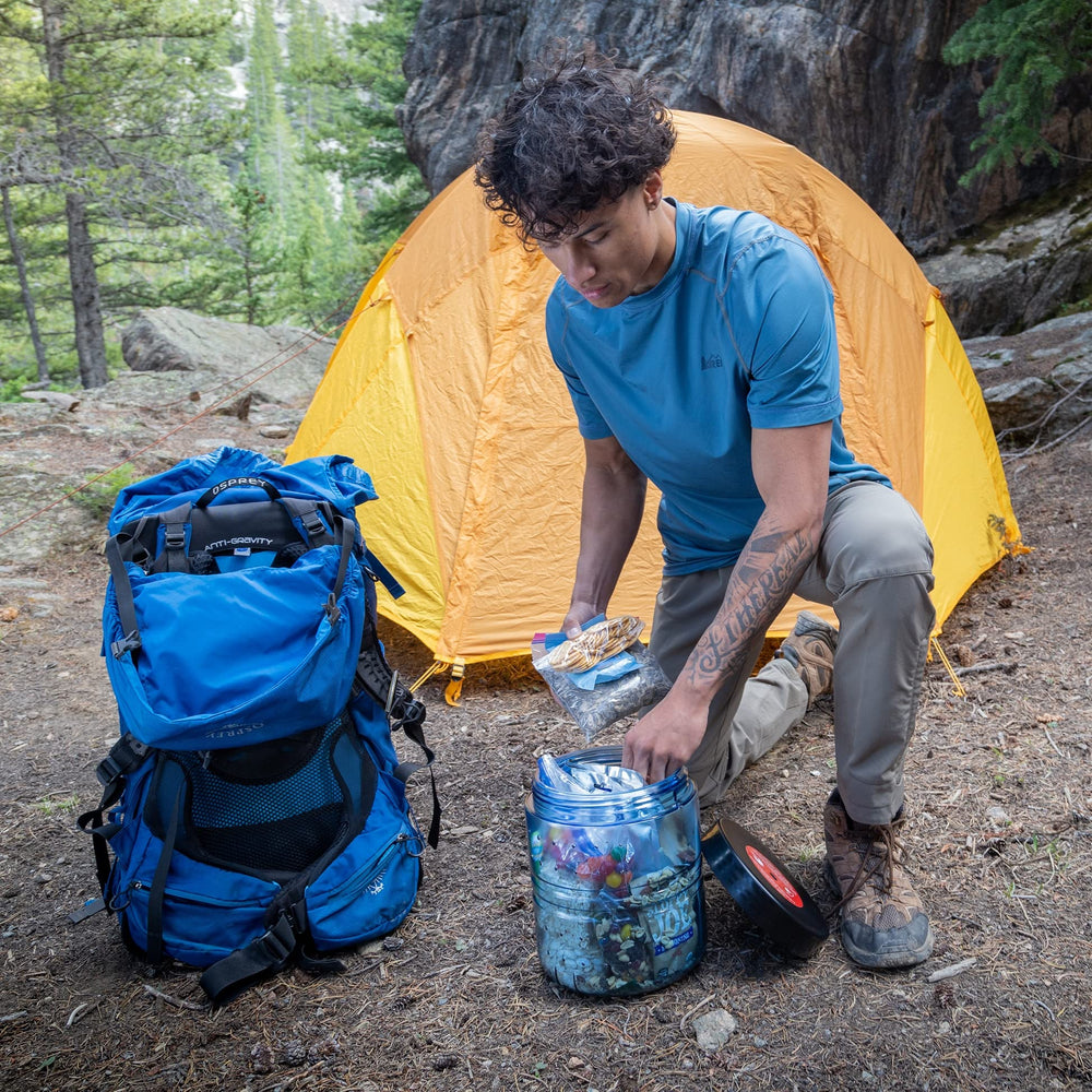 BearVault BV475 Trek camp stool-use shows versatile seating during rests.