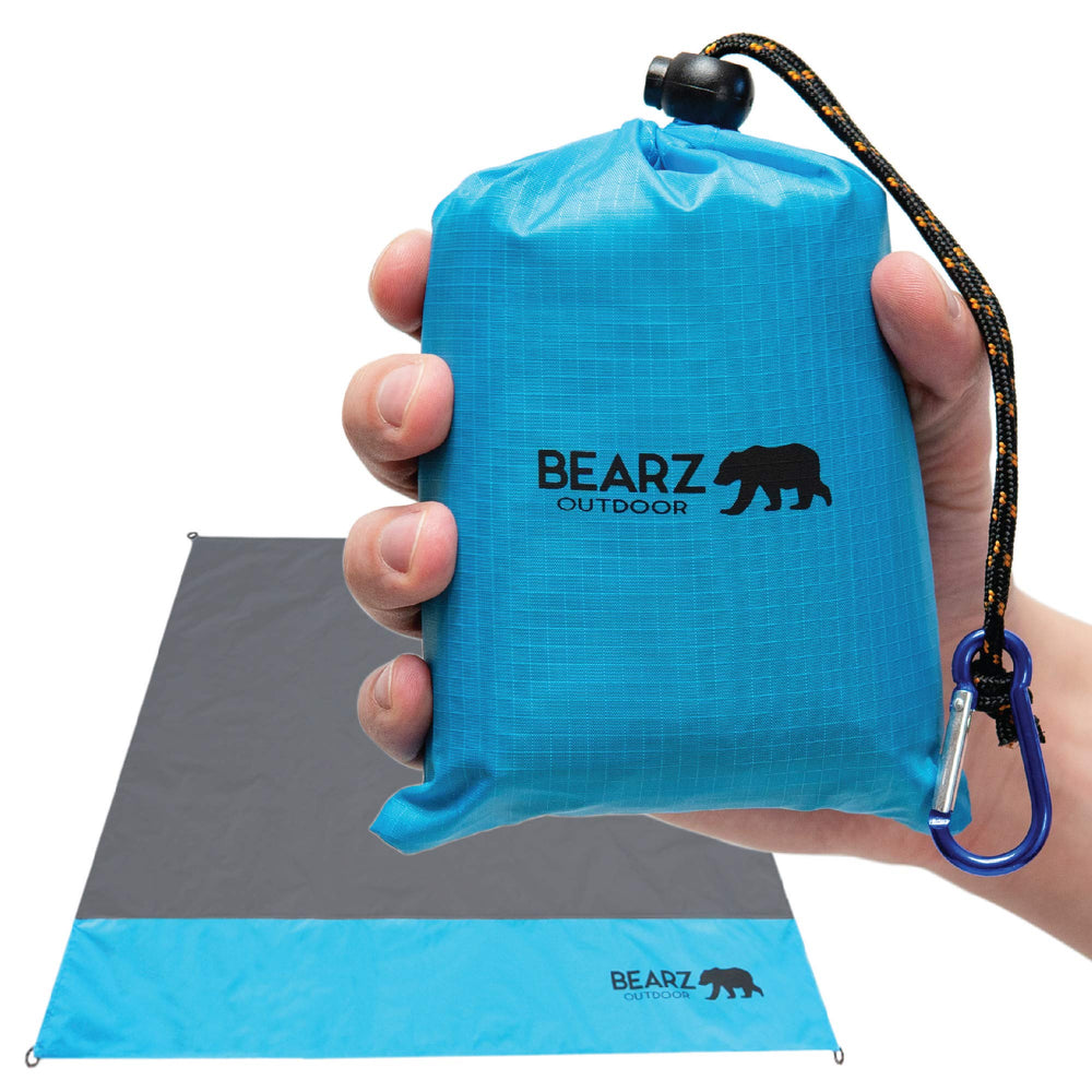 BEARZ Outdoor pocket blanket blue folded for ultra-compact travel and quick picnics